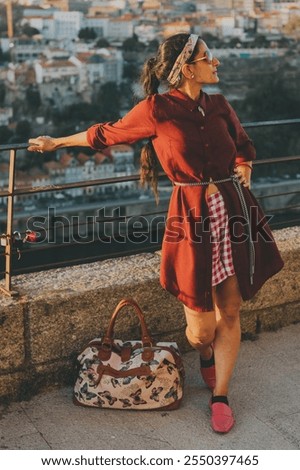 Similar – Image, Stock Photo Light red summer dress with floral pattern in the style of the fifties and sixties in the summer at the flea market at the Golden Oldies in Wettenberg Krofdorf-Gleiberg near Giessen in Hesse