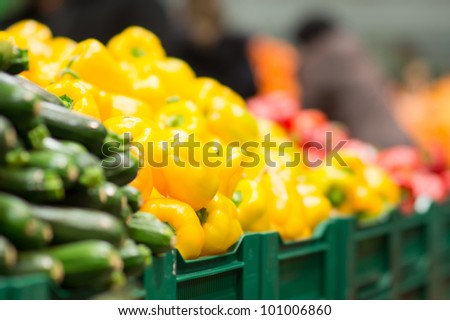 Varitey of peppers on boxes in supermarket