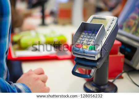Credit Card payment Terminal in restaurant