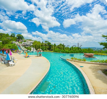 Songkhla, 01 july 2015: Giant open air pool and looped river pool in huge aqua park on top of hill of Songkhla zoo in Songkhla town, Songkhla province, Thailand.