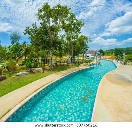 Songkhla, 01 july 2015: Scenic view of looped river pool and surroundings in open air aqua park on hill of Songkhla zoo in Songkhla town, Songkhla province, Thailand.