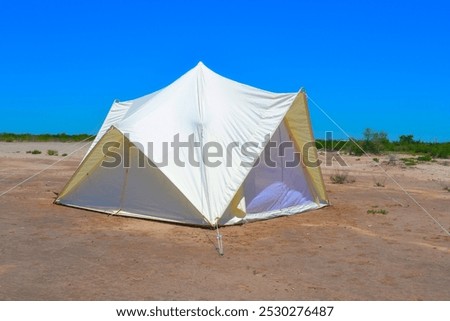 Similar – Image, Stock Photo a taut rope on the beach holding up a boat