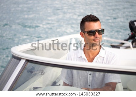The man has a rest on a yacht in voyage
