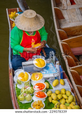 Bangkok, Thailand - October 20, 2014: seller at Amphawa Bangkok floating market at Bangkok, Thailand on October 20, 2014