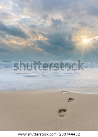 Footprints on the beach in Koh Samui Thailand