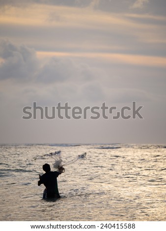 Fisherman on the beach of Kuta in Bali Indonesia