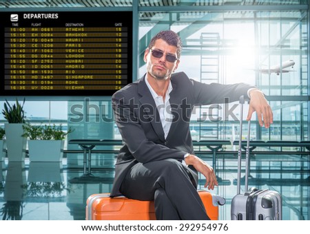 Business man in suit waiting at the international airport
