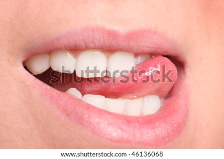 A Close up a smiling mouth of the girl
