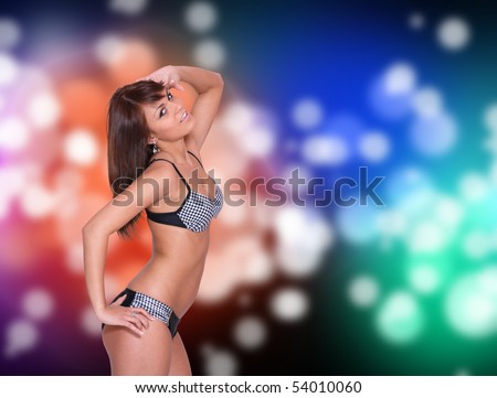 Beautiful young woman in bikini  posing over abstract background