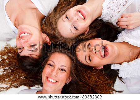 Group Of Happy Pretty Laughing Girls Over White Background Stock Photo ...