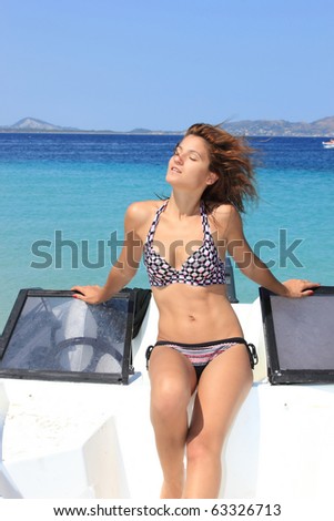 beautiful girl on speed boat in Greece - Motion blur