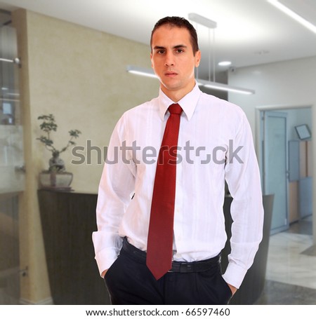 Young business man in the office workplace.