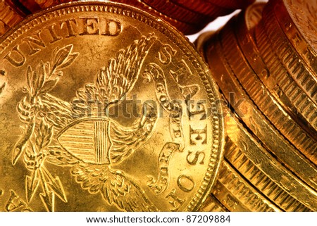 American gold coins on dark background