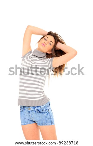 young woman in jeans shorts, studio white