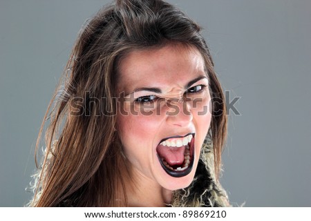 Beauty young woman screaming portrait