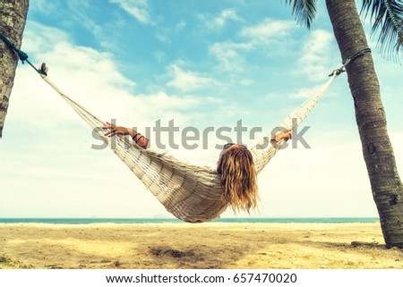 Similar – Image, Stock Photo Relaxing on the hammock. Baby wagtail (Motacilla alba) young bird in the garden, in the sunlight