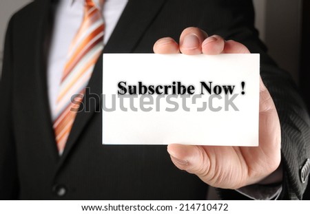 businessman showing his business card with the message subscribe now