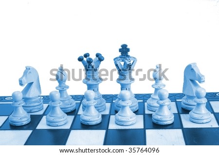 chess pieces on board - white background - symbol of strategy
