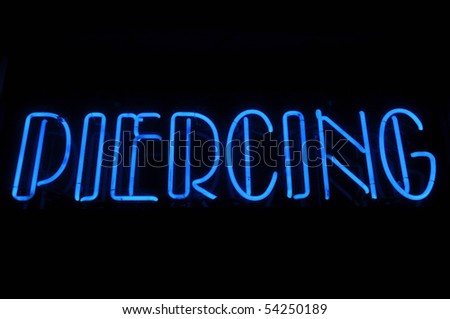 Piercing Electric Blue Neon Text Sign