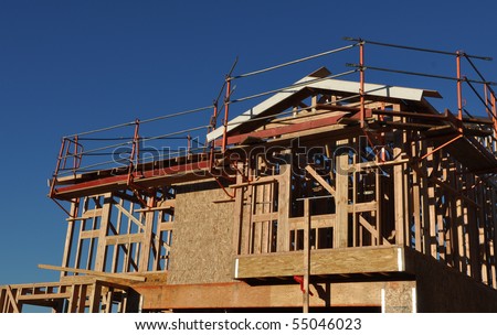 New Two Story Home Under Construction with Blue Sky