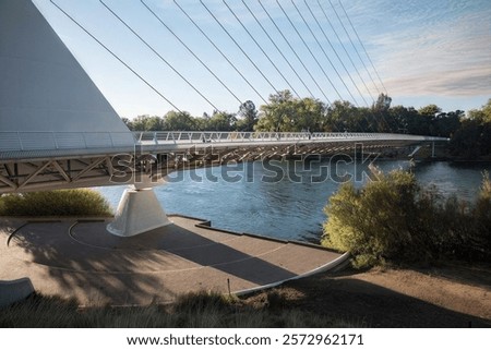 Similar – Image, Stock Photo Large bridge over river with cars traffic