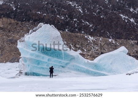 Similar – Image, Stock Photo Rocky formations near still lake