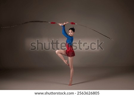 Similar – Image, Stock Photo Graceful acrobat performs with hoop on beach