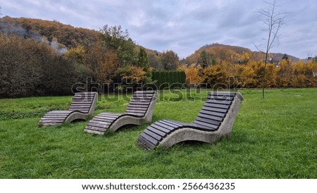 Similar – Image, Stock Photo Three-seated rock in the evening light