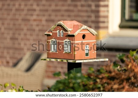 Image, Stock Photo Birdhouses on a facade