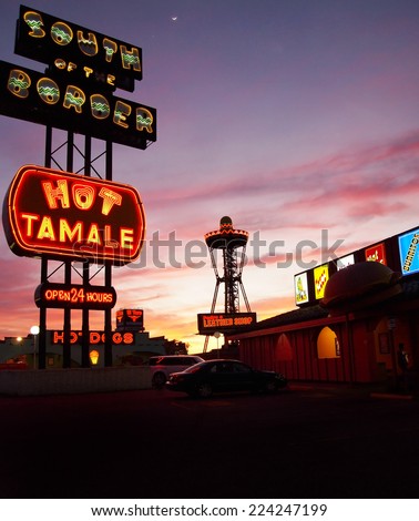 HAMER, SOUTH CAROLINA -  FEBRUARY 25, 2012: South Of The Border, a popular tourist stop for travelers just over the North Carolina/South Carolina line, glows with kitschy neon signs at after sunset.