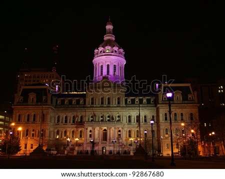 BALTIMORE - JAN. 15: Baltimore's City Hall has a purple glow amid purple flood lights and gels in honor of the Ravens football team playing in the NFL playoffs on January 15, 2012 in Baltimore, MD