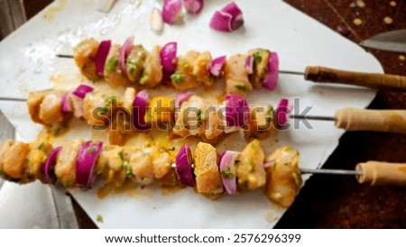 Similar – Image, Stock Photo Roasted marinated chicken pieces with vegetables in black baking dish