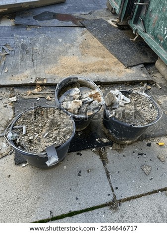 Similar – Image, Stock Photo Bucket with building rubble in front of a facade