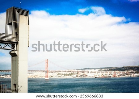 Similar – Foto Bild Die berühmte Brücke Ponte 25 de Abril in Lissabon, Portugal, im Hintergrund einer ruhigen Straße