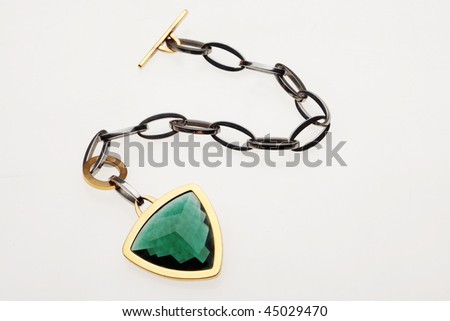 gold plated chain bracelet with green crystal