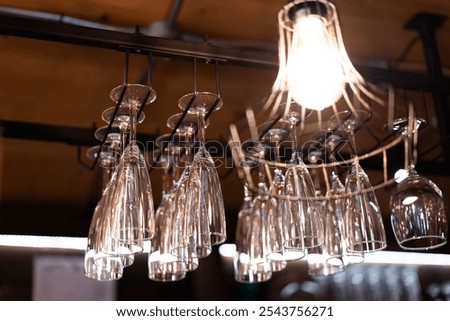 Image, Stock Photo Clean glasses hanging in bar