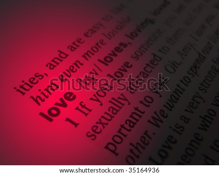 Close up of the word love in the english dictionary