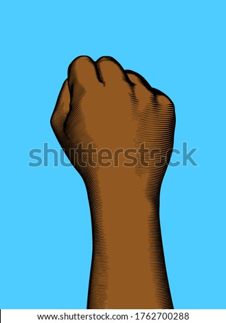 Vintage engraved drawing right back of black human hand fist gesture vector illustration isolated on light blue background