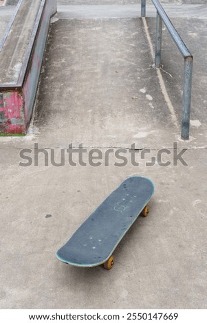 Similar – Image, Stock Photo Skateboard arena in the evening sun, cordoned off with red and white flutterband | Corona Thoughts