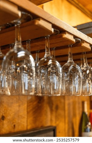 Similar – Image, Stock Photo Clean glasses hanging in bar