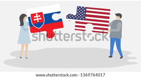 Couple holding two puzzles pieces with Slovak and American flags. Slovakia and United States of America national symbols together.