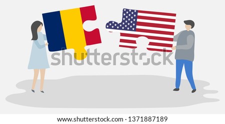 Couple holding two puzzles pieces with Chadian and American flags. Chad and United States of America national symbols together.