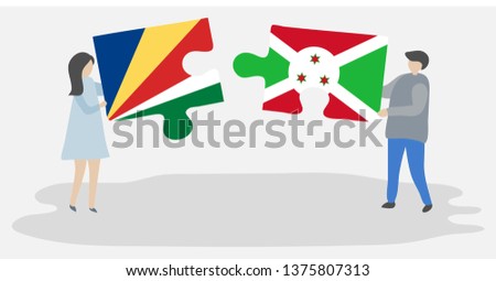 Couple holding two puzzles pieces with Seychellois and Burundian flags. Seychelles and Burundi national symbols together.