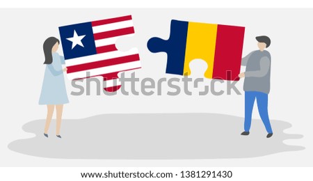 Couple holding two puzzles pieces with Liberian and Chadian flags. Liberia and Chad national symbols together.