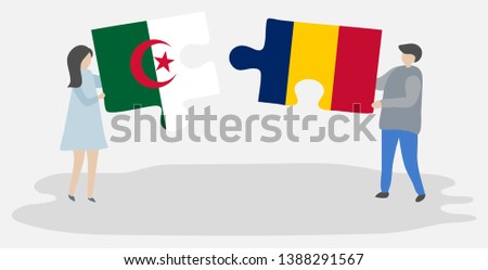 Couple holding two puzzles pieces with Algerian and Chadian flags. Algeria and Chad national symbols together.