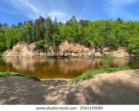 Image, Stock Photo calm water in Latvian winter / river near my house / the day when ice forming on water / sunrise over land