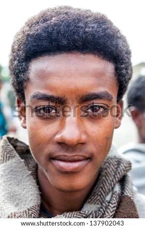 GASENA, ETHIOPIA - AUG 2: Ethiopian man posing, Gasena weekly market brings together various ethnic groups in the north to exchange or sell their products on Aug 2, 2001 in Gasena, Ethiopia