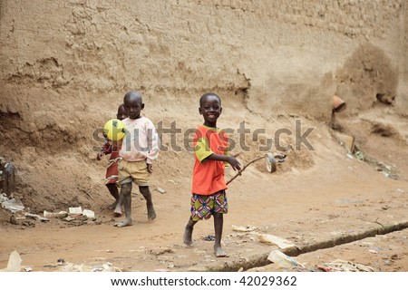MALI - AUGUST 17: Children playing in a street in Djenne, in Djenne the population belonging to ethnic Peul, Dogon and Bambara, August 17, 2009 in Djenne, Mali
