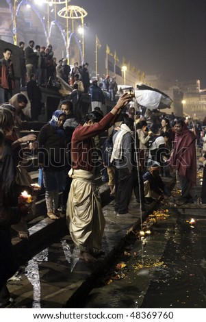 VARANASI - DECEMBER 1: Aarti ceremony, every night is celebrated in the ghats of the Ganges River Ceremony smoke purifies the soul, December 31, 2009 in Varanasi, India