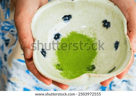 Similar – Image, Stock Photo Tea bowl fine blue and white patterned in Japanese Tokusa design with freshly brewed Assam organic black tea on which some air bubbles float